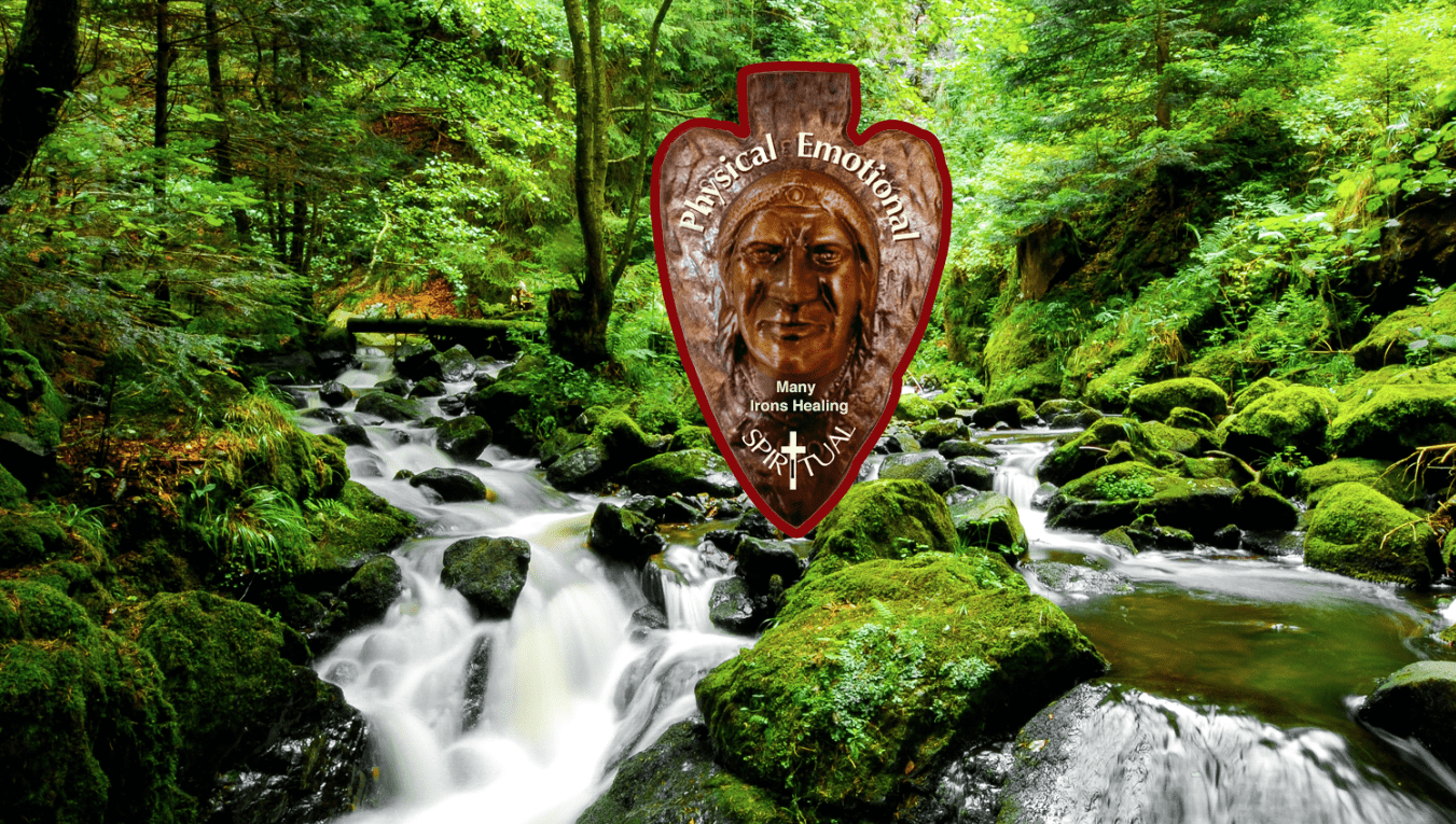 A tranquil forest stream flows over rocks, surrounded by lush greenery. A Native American-themed artwork of a face and feathers is digitally overlaid with text about physical and emotional healing.